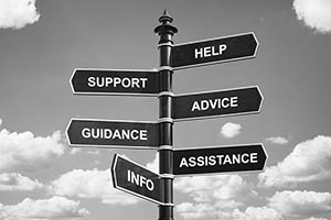 Help, support, advice, guidance, assistance and info crossroad signpost business concept